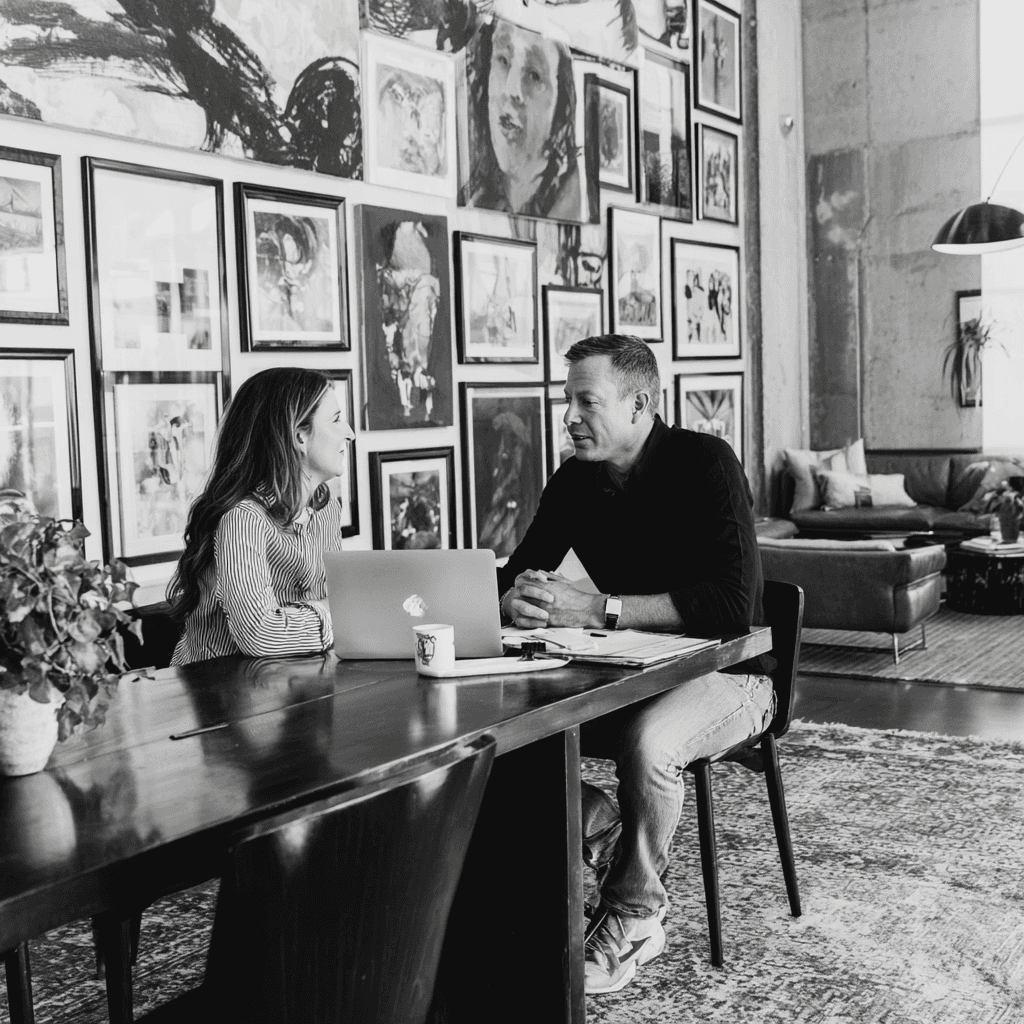 photo of a designer speaking to a client